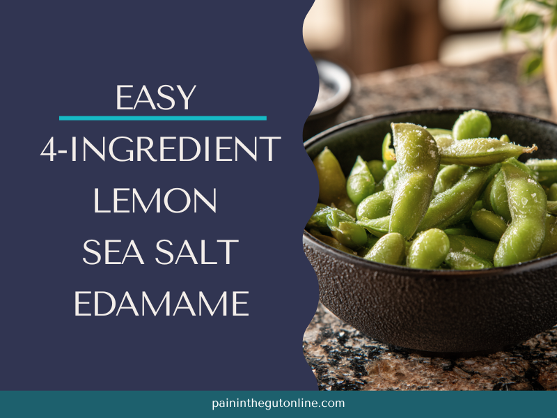 Lemon Edamame in a small black bowl, steamed and coated with lemon and sea salt - ready to eat